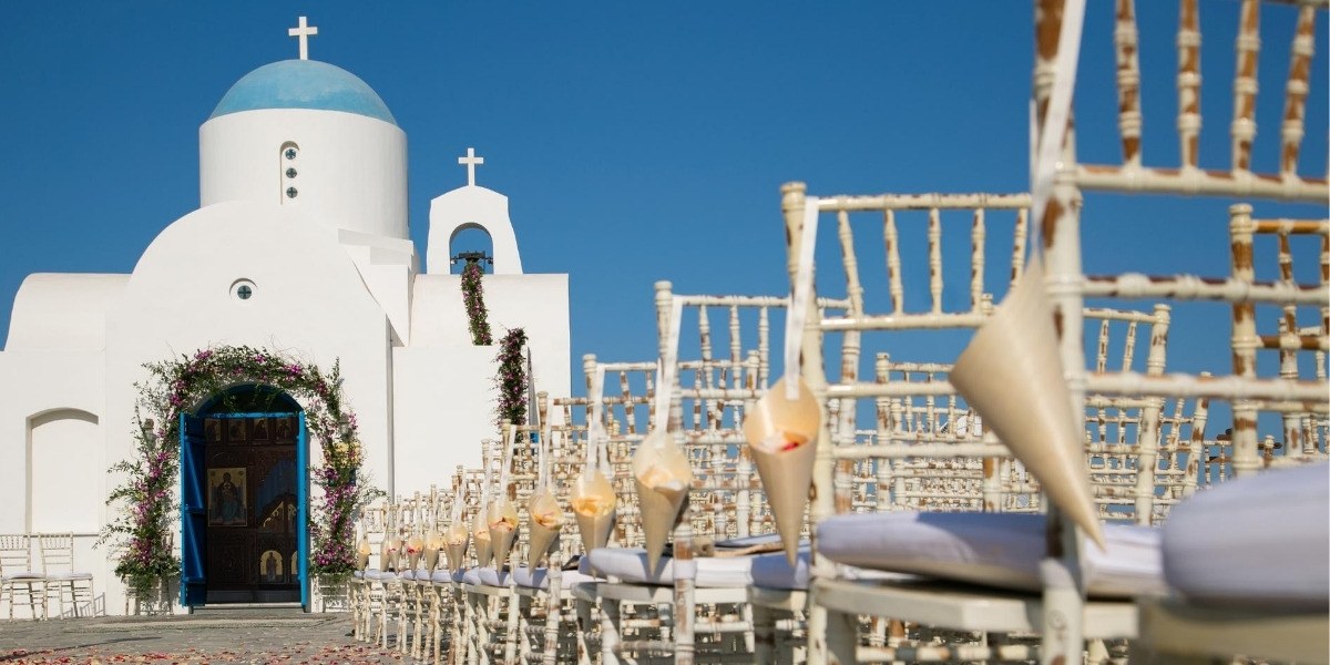 decorated church and chairs in Greece, just before wedding ceremony