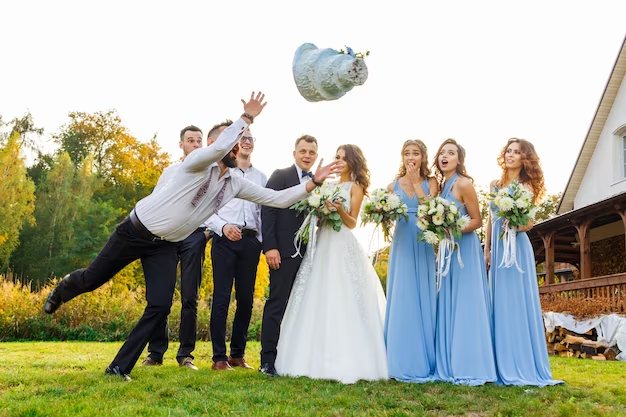 Groomsman drops cake at wedding